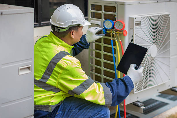 Professional Air Conditioning Repair technician working in Bellefontaine, OH